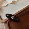 Metallic Flower Acrylic Snap Hair Clips โ Premium Wholesale Collection