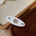 Metallic Flower Acrylic Snap Hair Clips – Premium Wholesale Collection